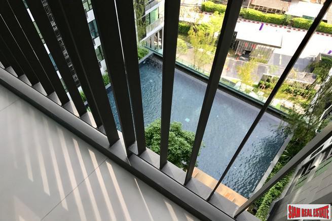 Rhythm Sukhumvit 36 | Comfortable One Bedroom Thong Lo Condo for Rent with City & Pool Views